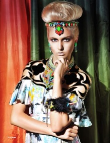 Elegant Magazine, December 2013 - Dreamy Jewellery editorial featuring Jolita Jewellery. A model is wearing colourful Dubai earrings hand-painted and covered in silk. Madrid Luxe statement necklace styled as a head-piece, Tribal Couture statement bangle and Carnival and Monaco necklaces.